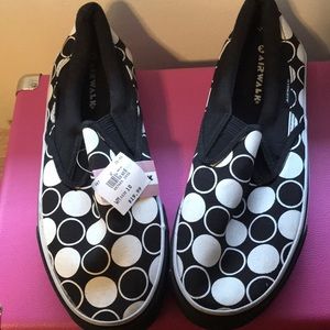 Black and white polkadot slip on shoes